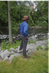 Man Overlooking The River